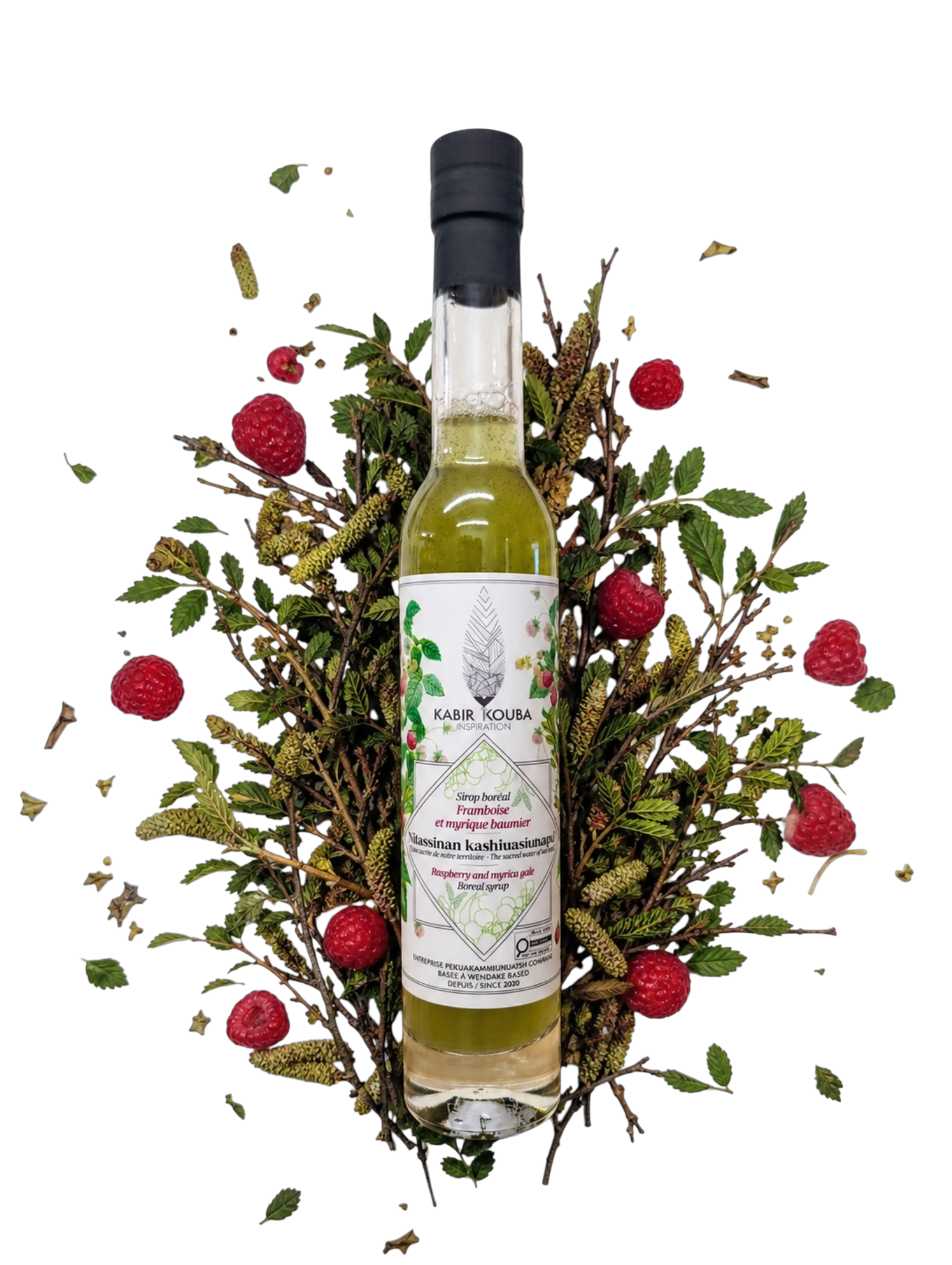 Bouteille de sirop boréal myrique baumier et framboise 200 ml par Kabir Kouba Inspiration, entourée de branches de myrique et de framboises